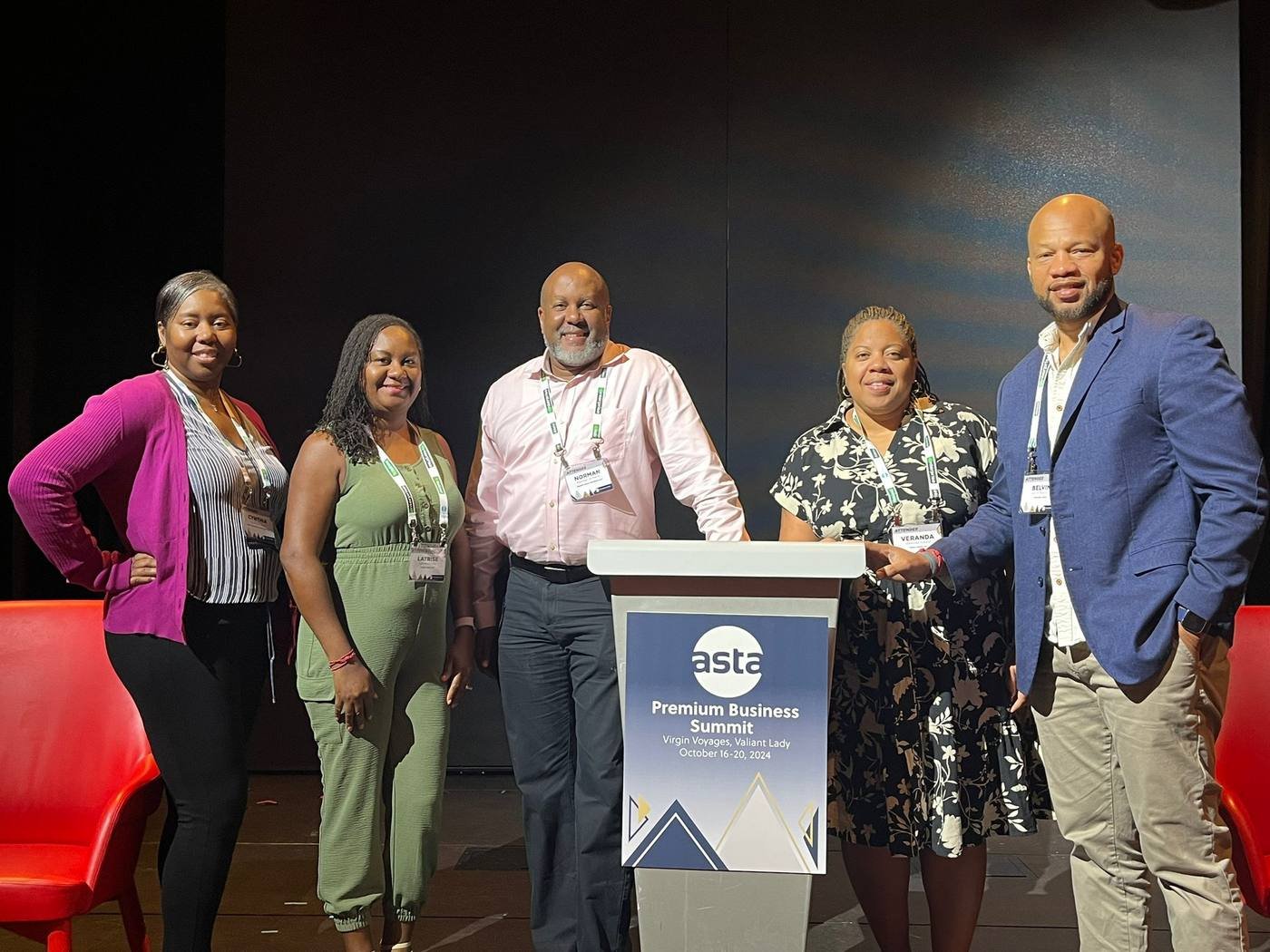 Norman Williams with fellow travel advisors on stage at the ASTA Premium Business Summit aboard Virgin Voyages Valiant Lady