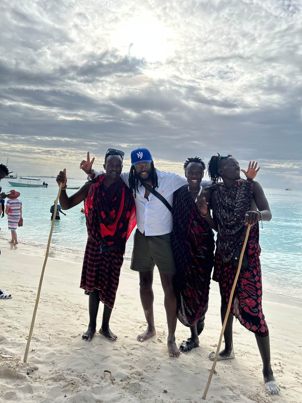 Nick with four people on a Zanzibar beach