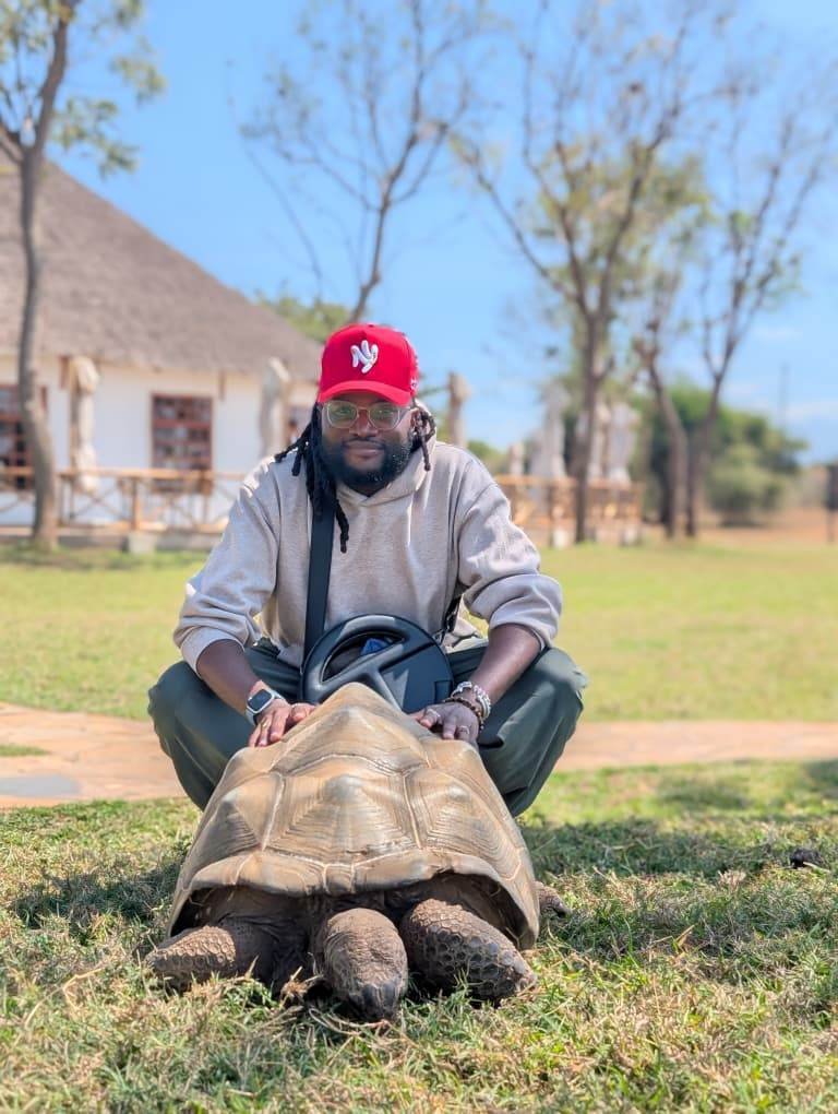 Nick with a giant tortoise