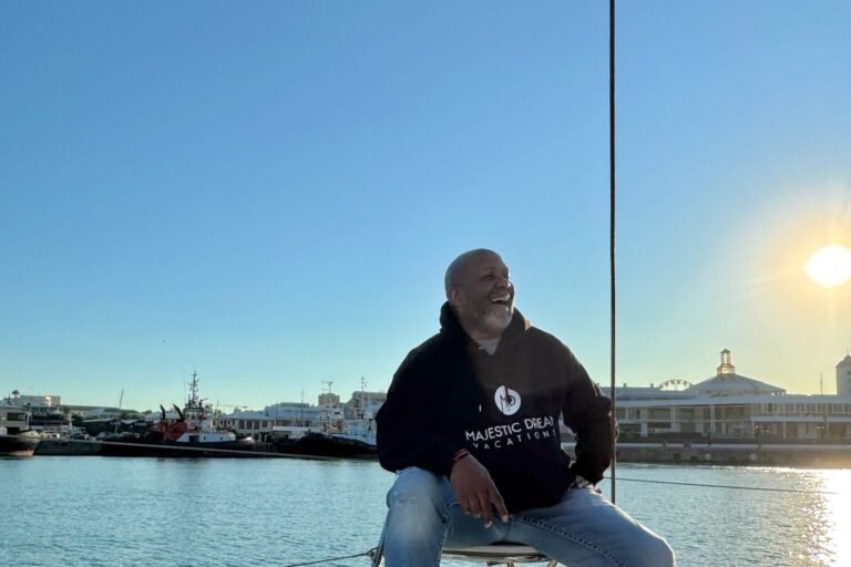 Norman Williams sailing in Cape Town at sunset