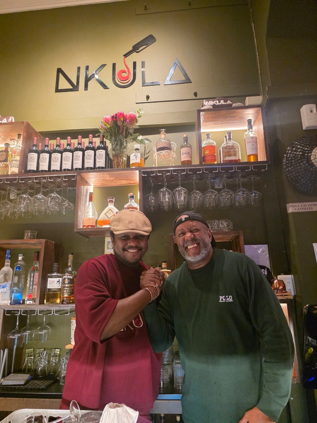Norman greeting a local host at Nkula